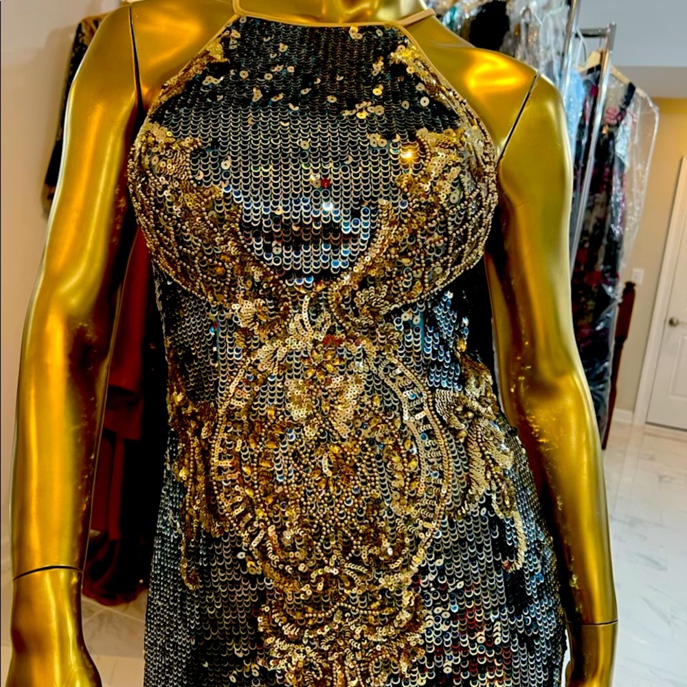 One of a kind!! Stunning evening gown perfect for that special occasion.